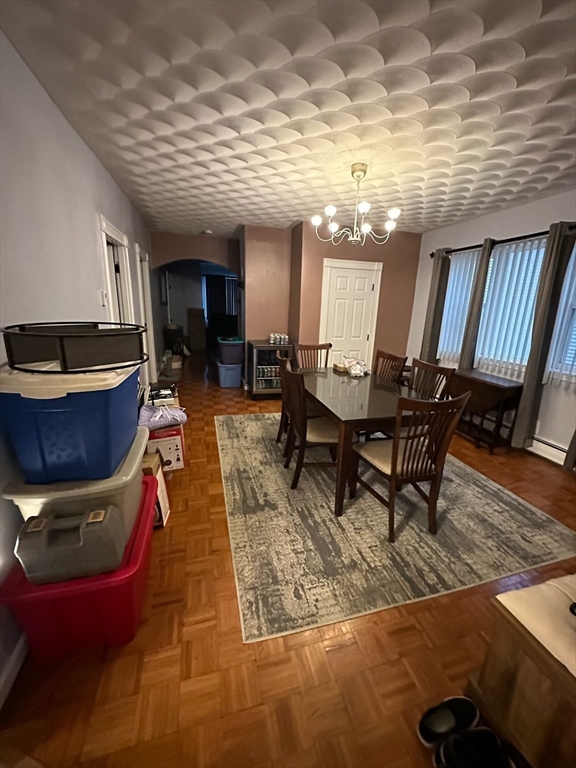 166 Bradford Avenue Fall River, MA 02721 - Photo 20 of 28 a living room with furniture a flat screen tv and kitchen view