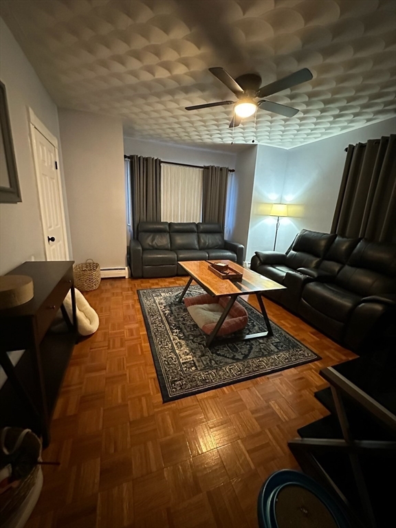 166 Bradford Avenue Fall River, MA 02721 - Photo 21 of 28 a living room with furniture and a lamp