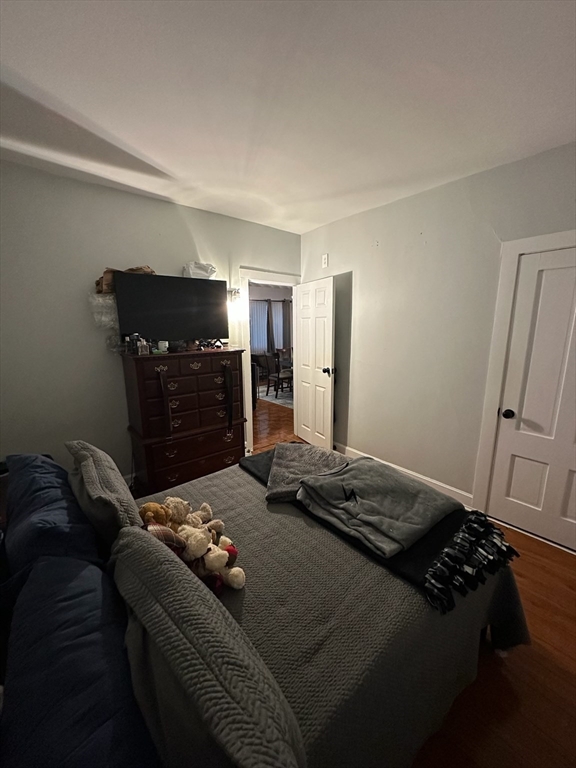 166 Bradford Avenue Fall River, MA 02721 - Photo 24 of 28 a bedroom with a bed and a mirror
