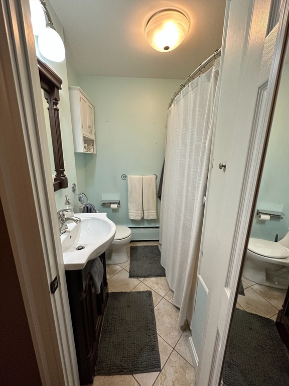 166 Bradford Avenue Fall River, MA 02721 - Photo 25 of 28 a bathroom with sink and a mirror
