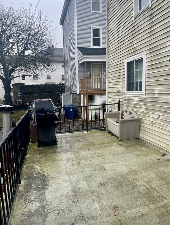 166 Bradford Avenue Fall River, MA 02721 - Photo 4 of 28 a view of a yard with furniture