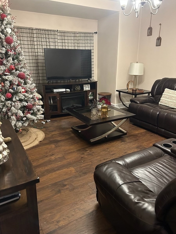 166 Bradford Avenue Fall River, MA 02721 - Photo 7 of 28 a living room with furniture and a flat screen tv