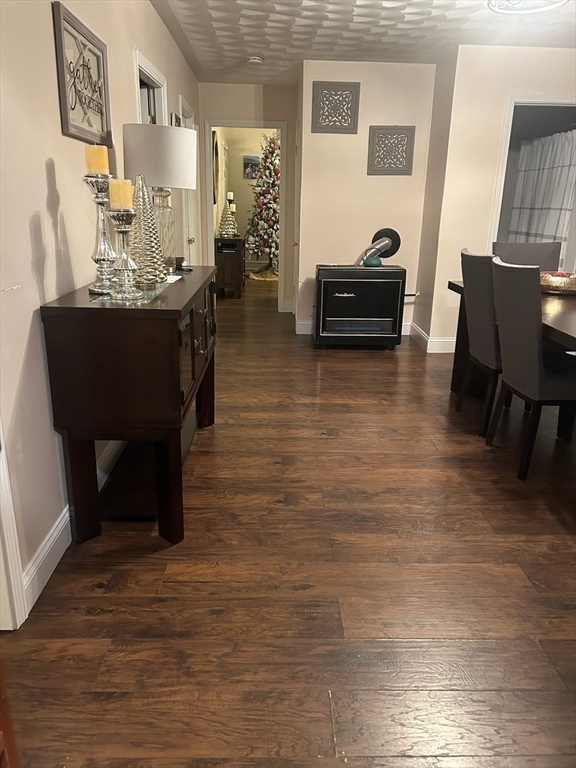 166 Bradford Avenue Fall River, MA 02721 - Photo 8 of 28 a living room with furniture and a wooden floor