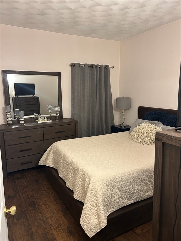 166 Bradford Avenue Fall River, MA 02721 - Photo 9 of 28 a bedroom with a bed and dresser