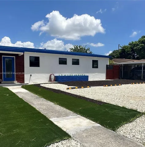 a house view with a garden space