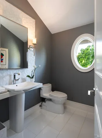 a living room with furniture and flat screen tv