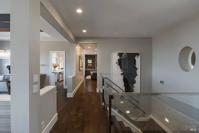a bathroom with a granite countertop sink a shower and a mirror