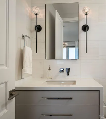 a room with furniture and a projector screen