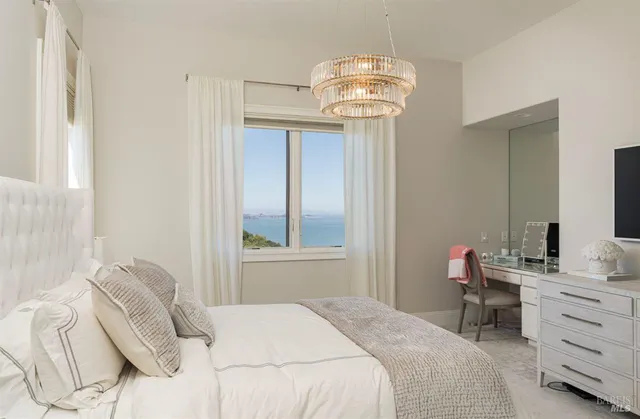 a dining room with a table and chairs