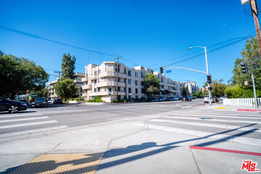 13920 Moorpark Street, Unit 201 Sherman Oaks, CA 91423 - Photo 22 of 25 a view of a tall buildings with a street