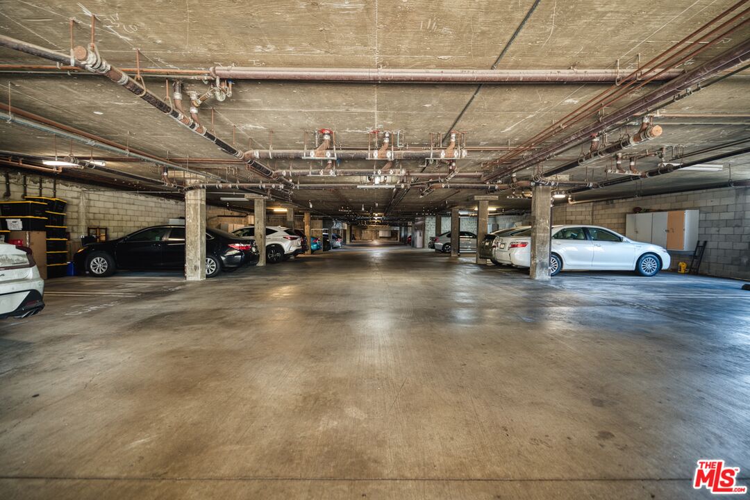 13920 Moorpark Street, Unit 201 Sherman Oaks, CA 91423 - Photo 24 of 25 a view of a parking area