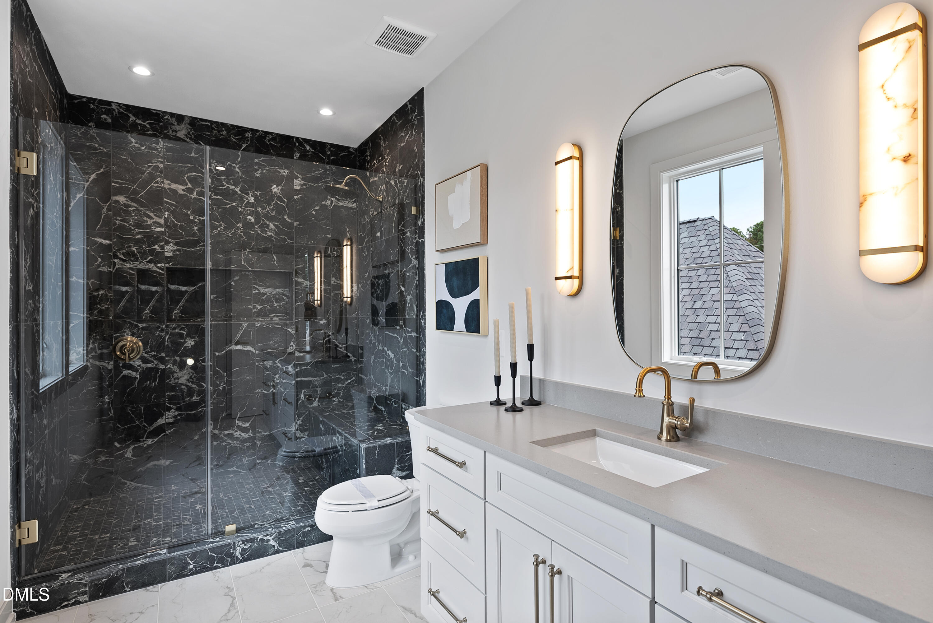 3416 Makers Circle Raleigh, NC 27612 - Photo 19 of 41 a bathroom with a toilet a sink and a mirror