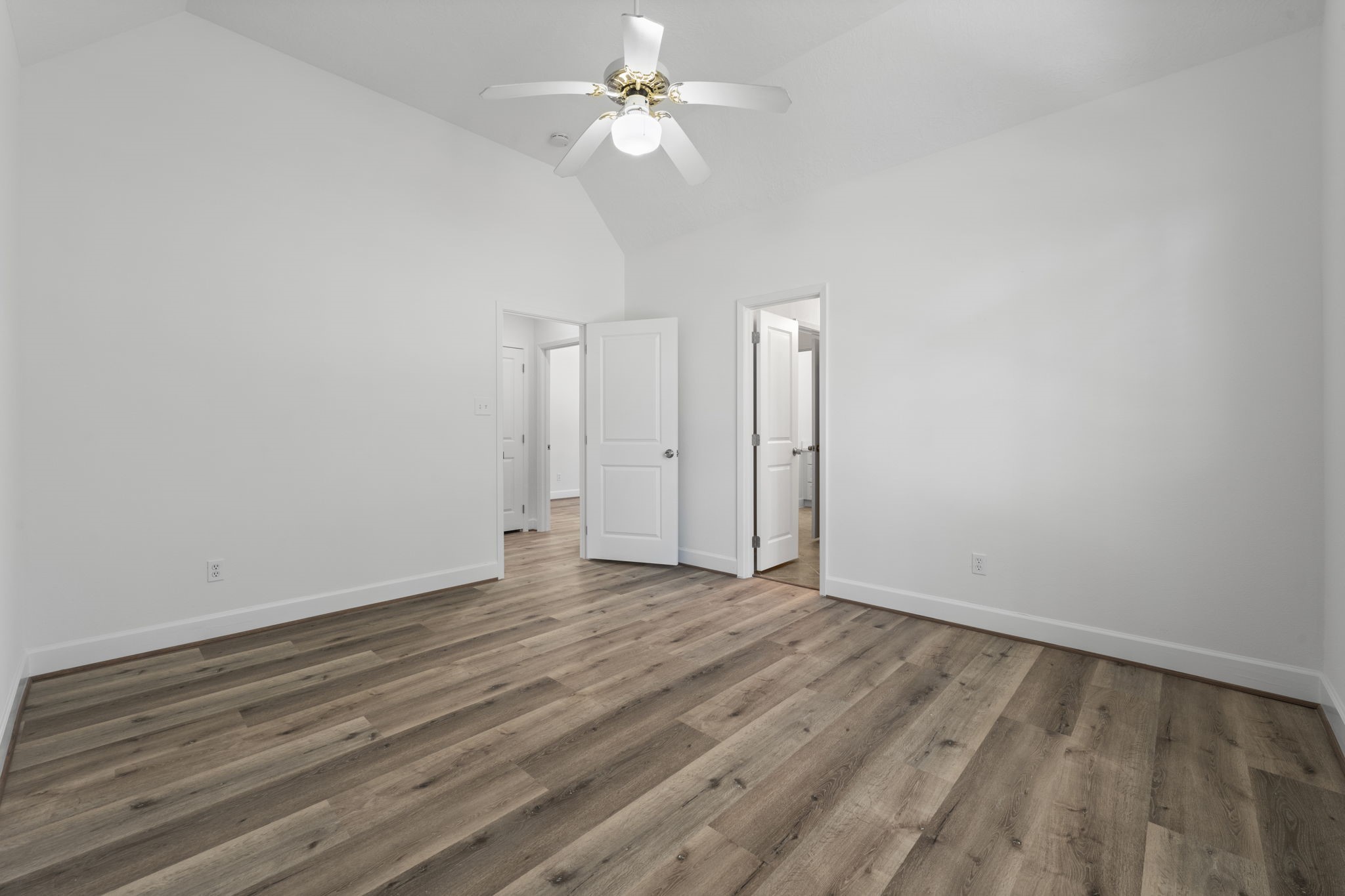15456 Pin Oak Drive Conroe, TX 77384 - Photo 31 of 44 wooden floor in an empty room