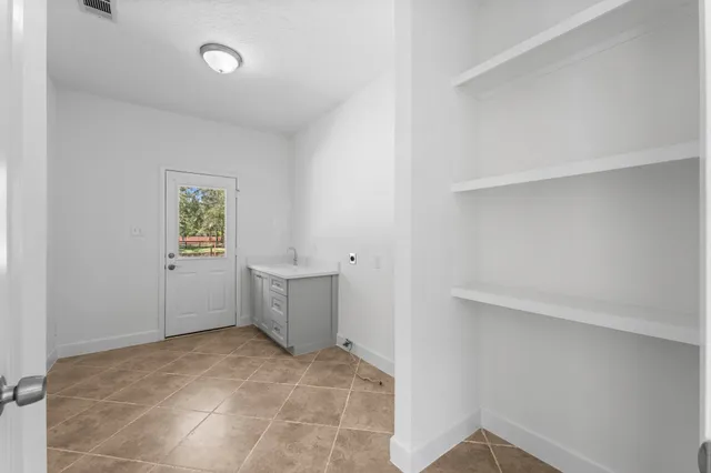 a view of a house with a garage