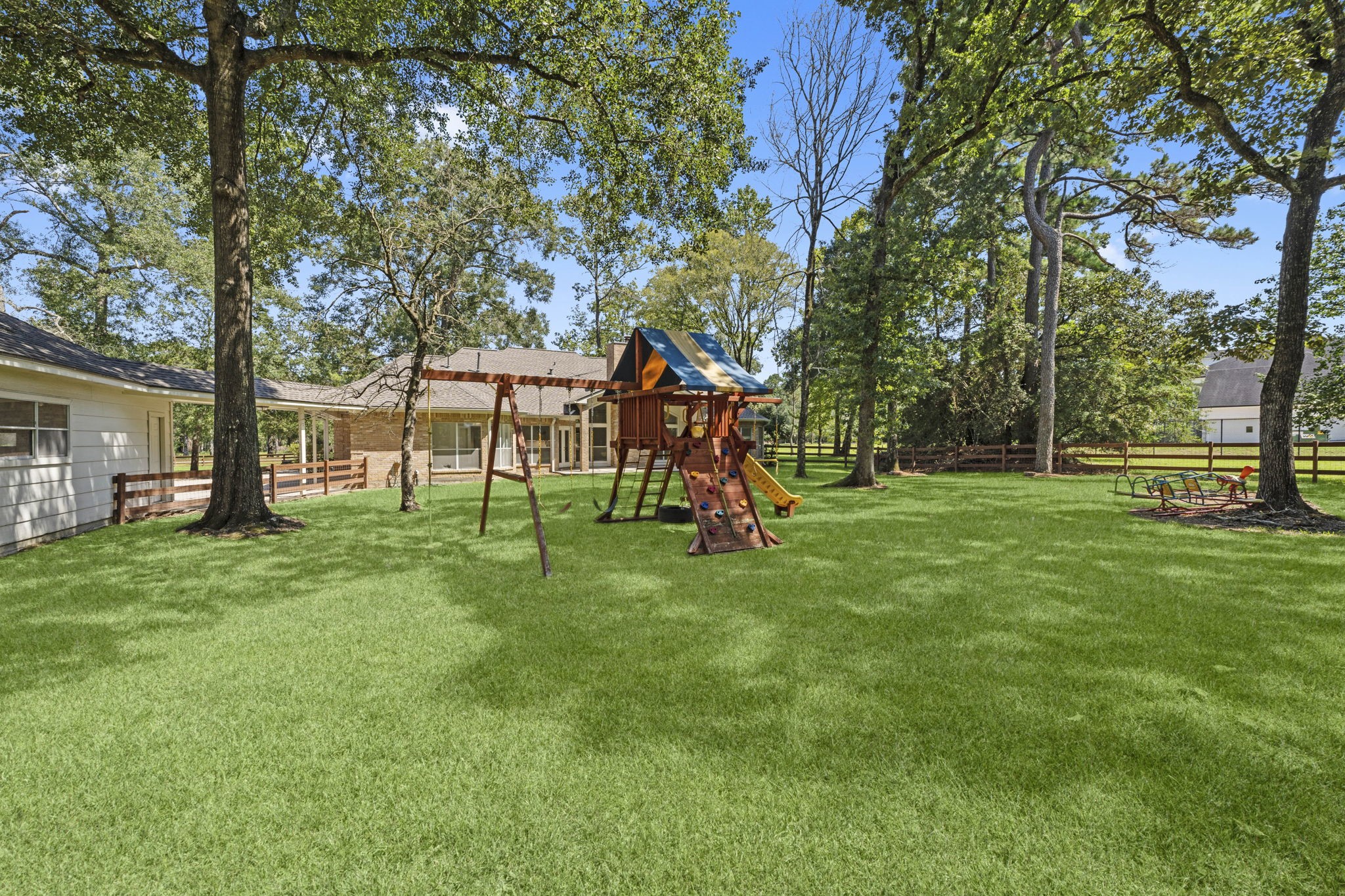 15456 Pin Oak Drive Conroe, TX 77384 - Photo 40 of 44 a view of a park with a slide