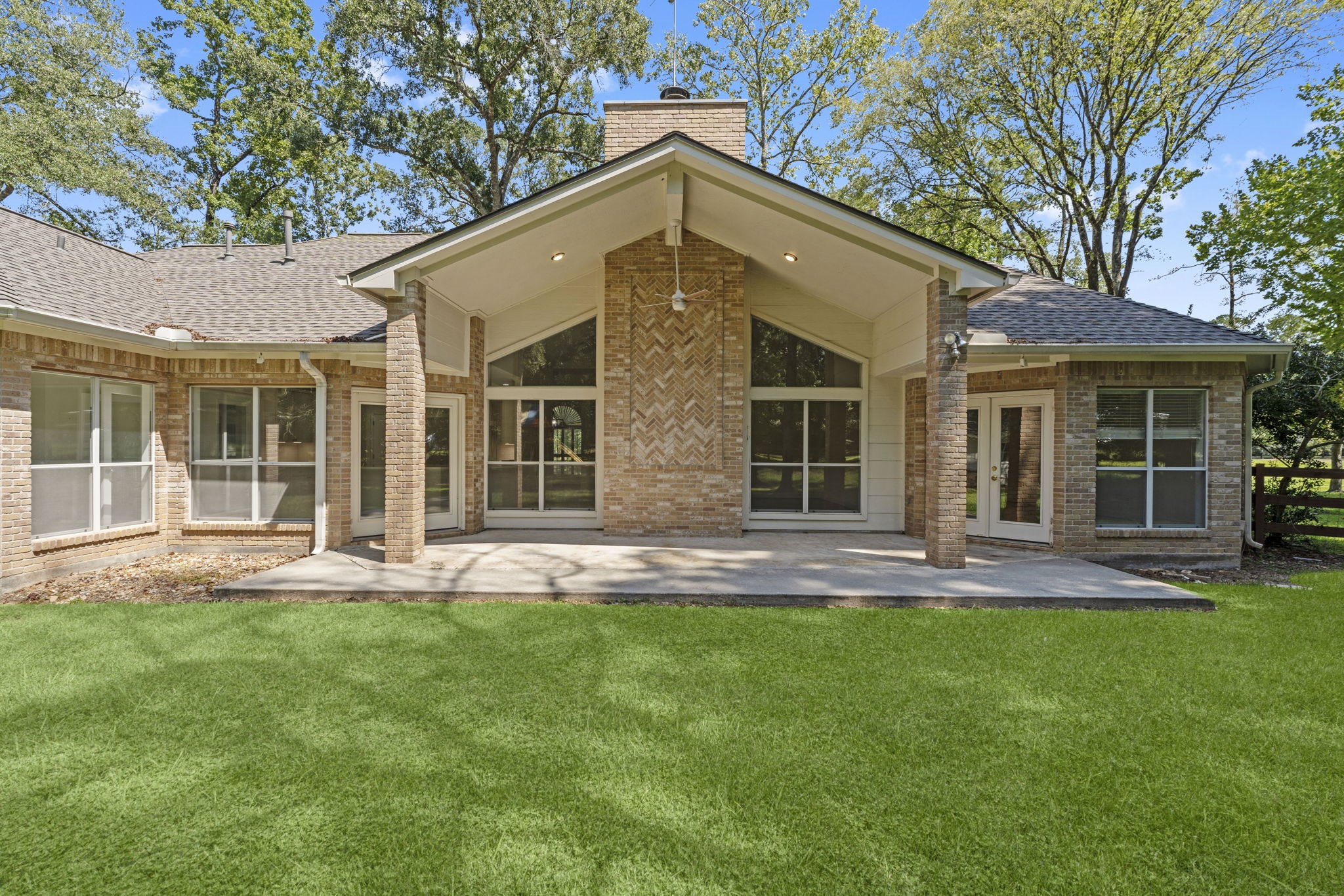15456 Pin Oak Drive Conroe, TX 77384 - Photo 42 of 44 front view of a house with a yard