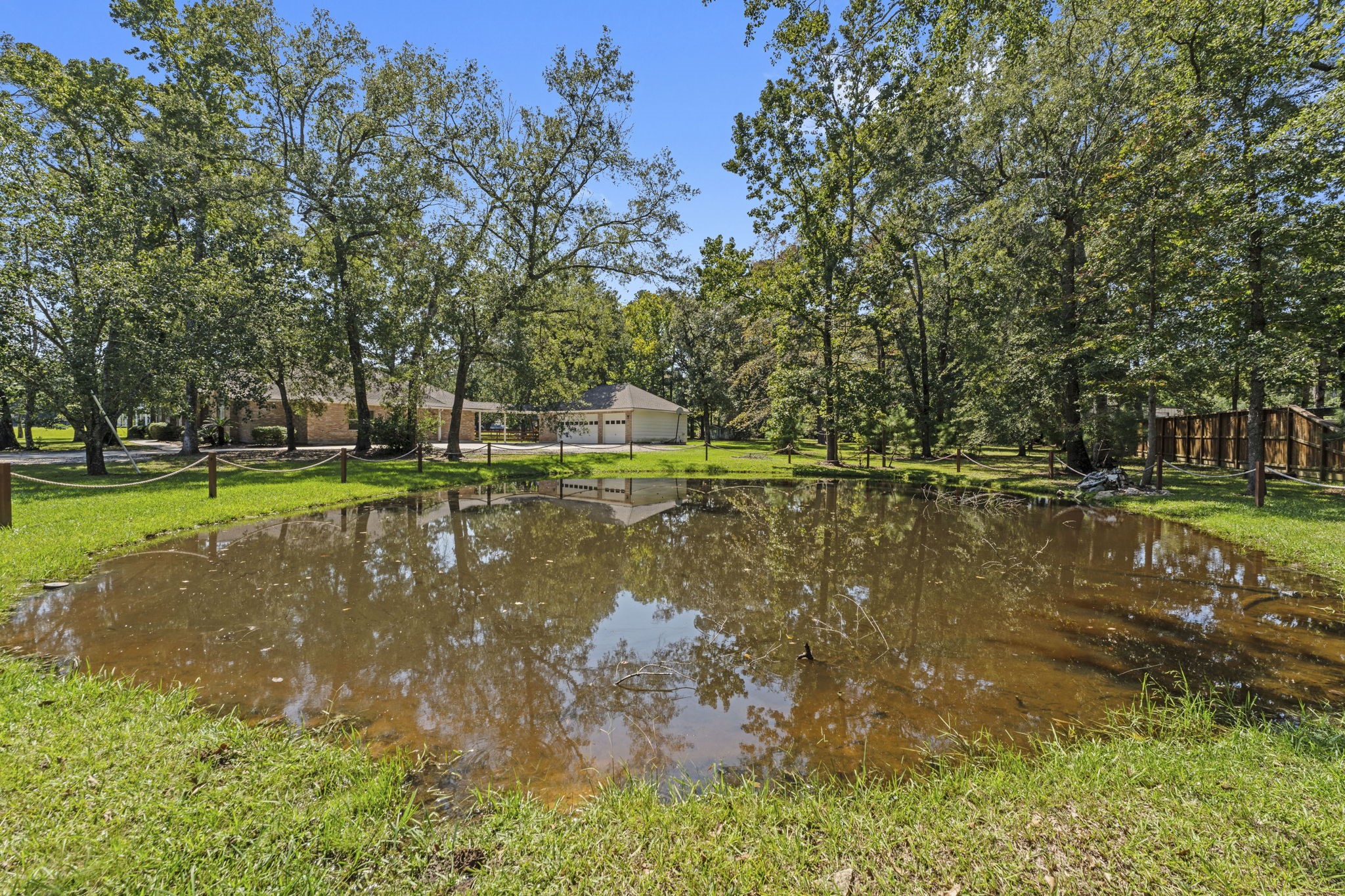15456 Pin Oak Drive Conroe, TX 77384 - Photo 7 of 44 a view of a lake view