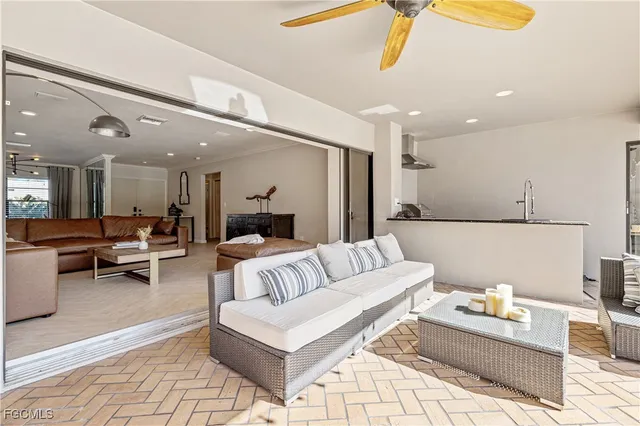 a living room with furniture and a rug