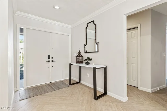 a spacious bedroom with a bed and a sink