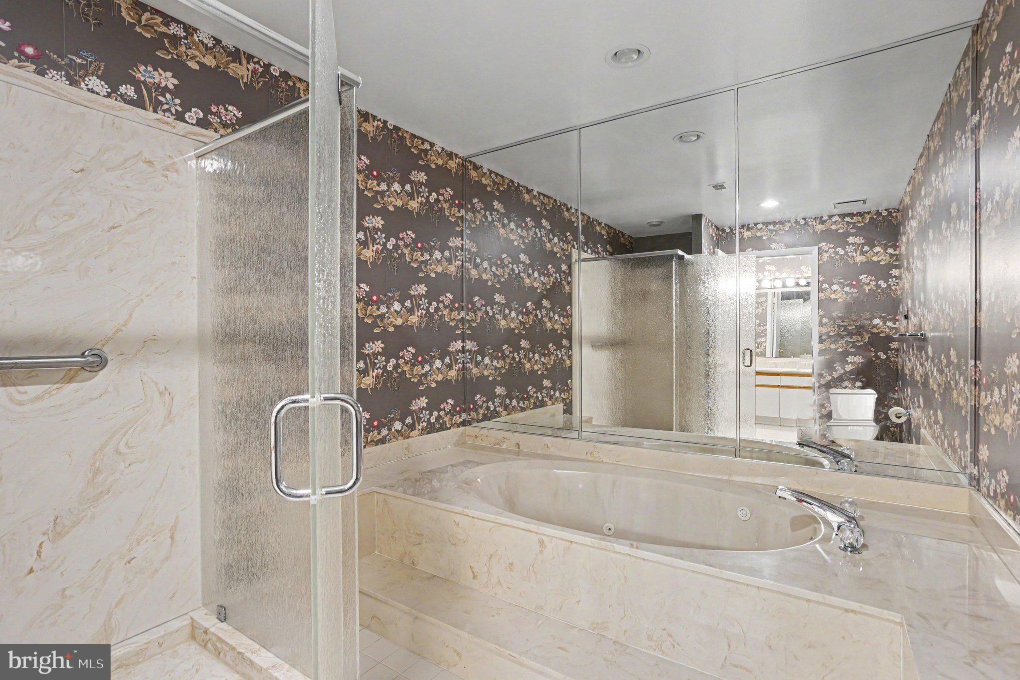 3021 Fallstaff Road, Unit 208B Baltimore, MD 21209 - Photo 21 of 25 a bathroom with a bath tub and shower