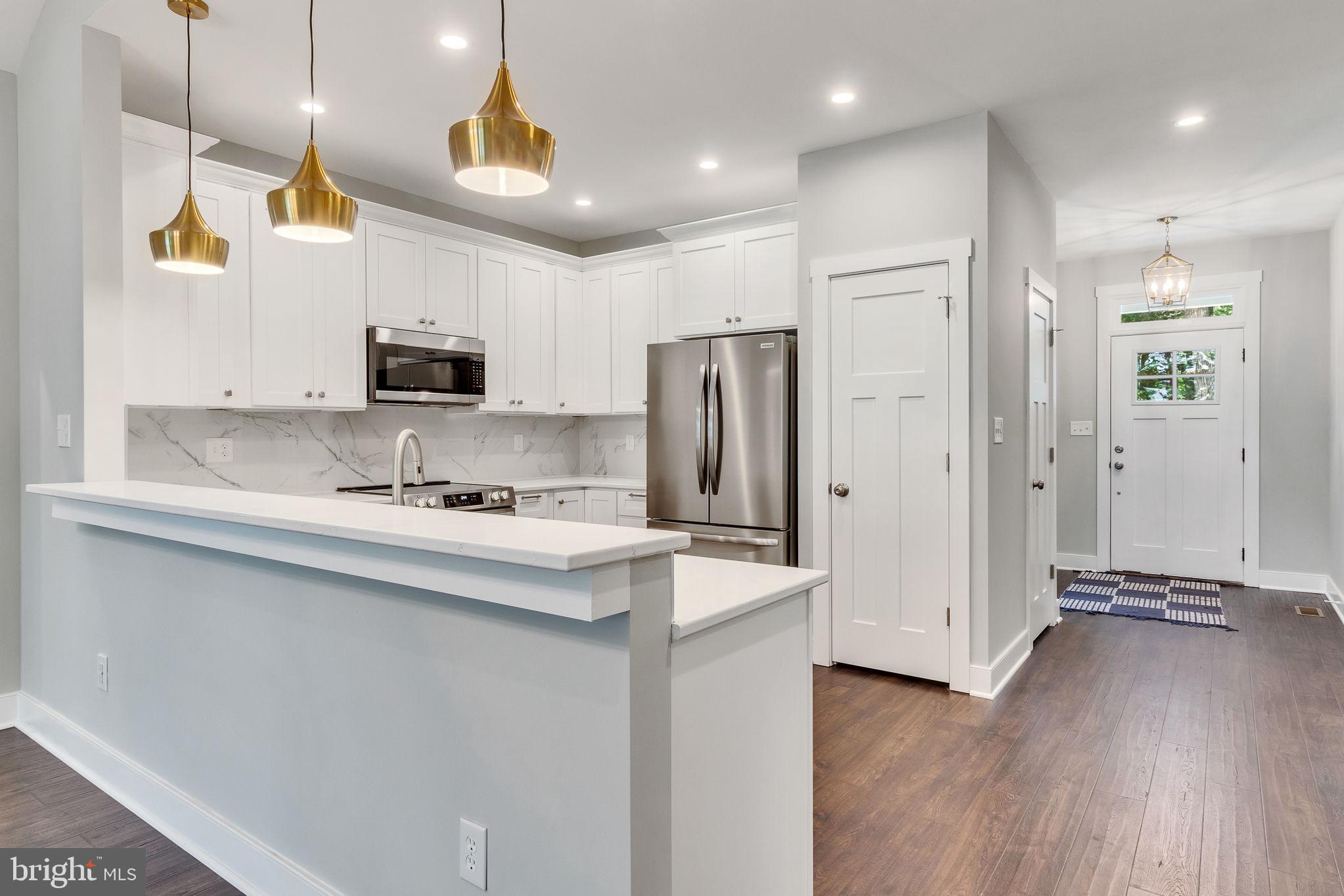 57 Waterman's Way Reedville, VA 22539 - Photo 4 of 43 Pendant lights, raised countertop, pantry