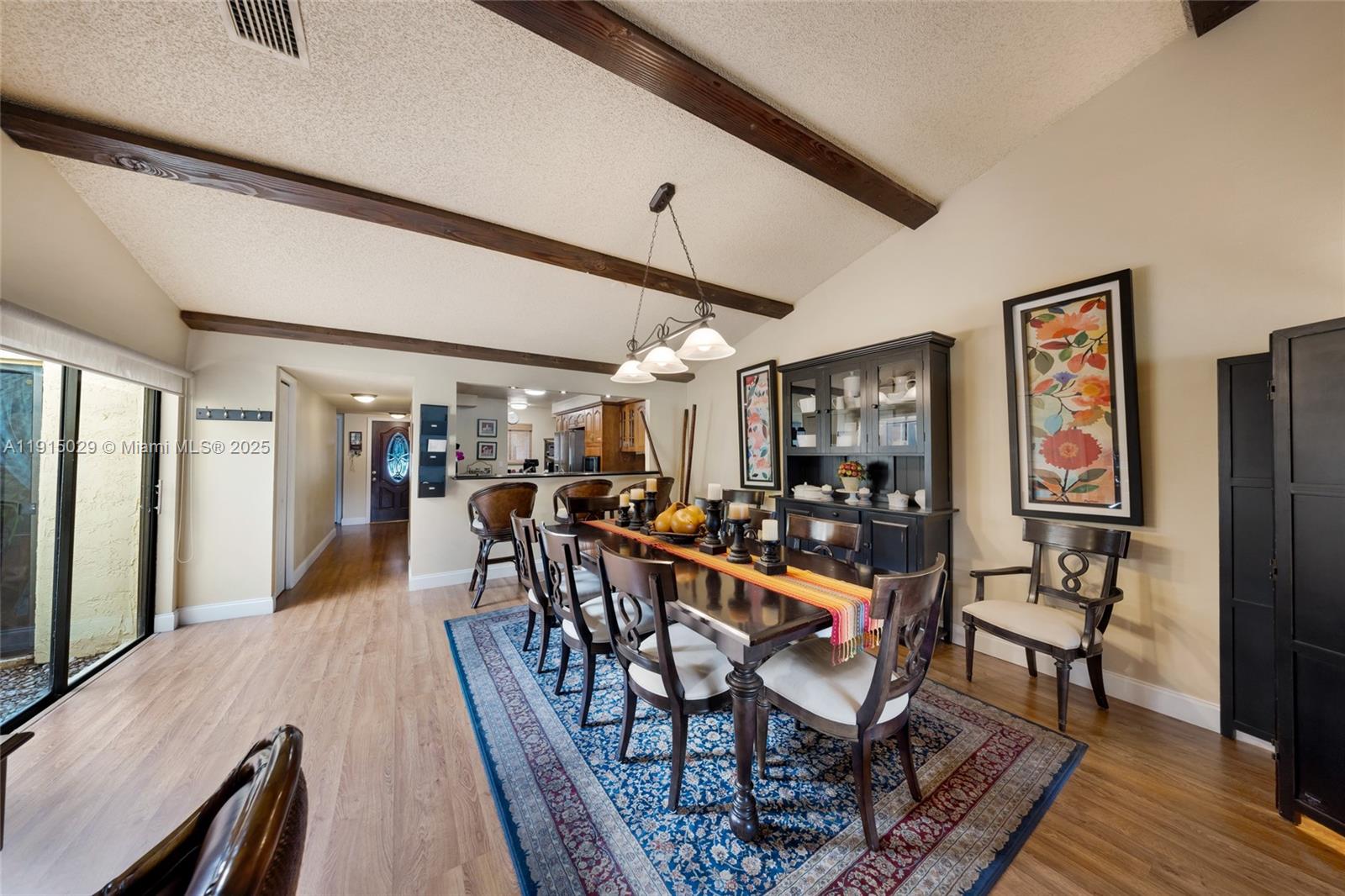 16175 Laurel Drive, Unit 27 Weston, FL 33326 - Photo 5 of 22 a view of a dining room with furniture