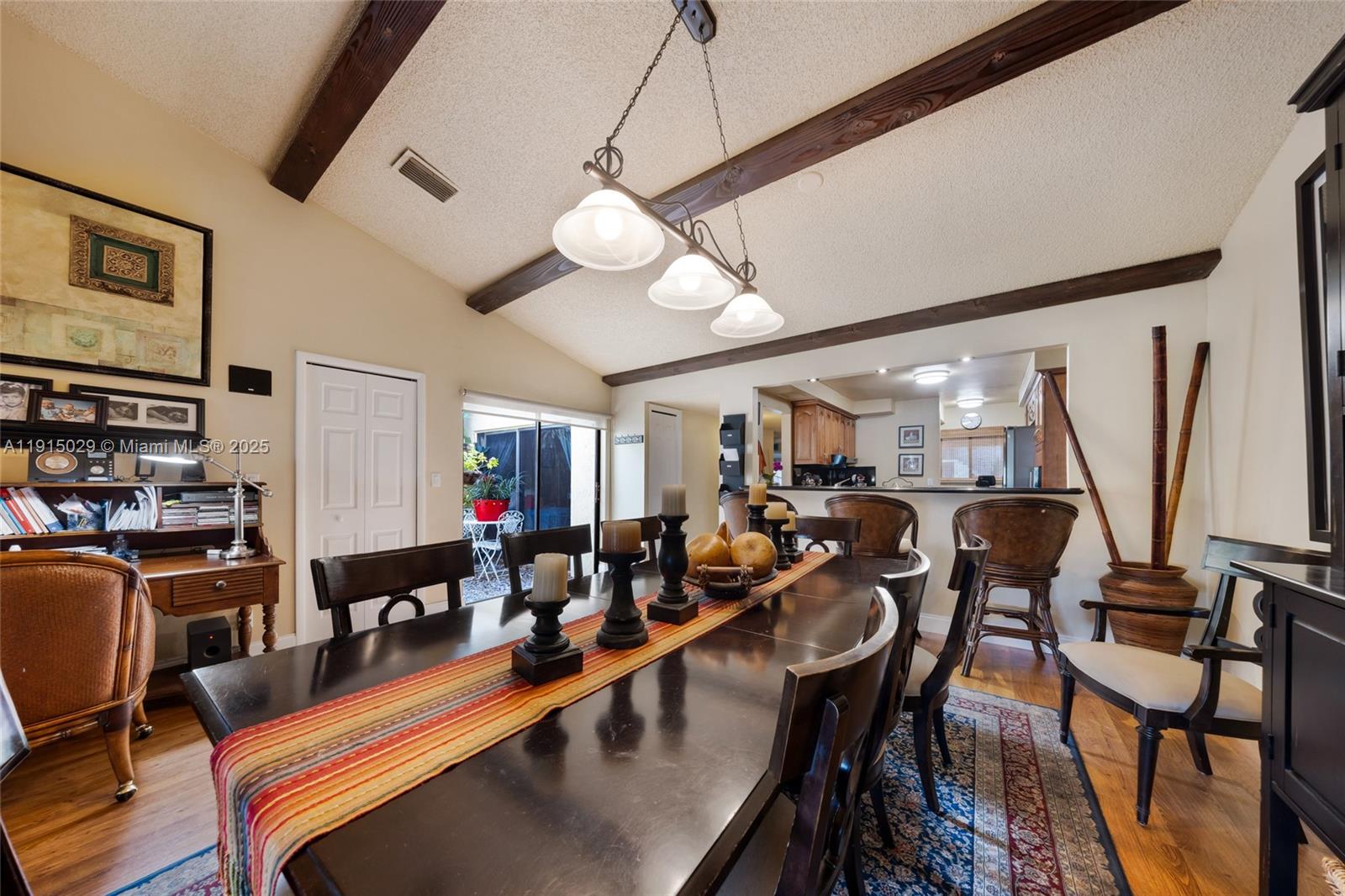 16175 Laurel Drive, Unit 27 Weston, FL 33326 - Photo 6 of 22 a living room with lots of furniture and a flat screen tv