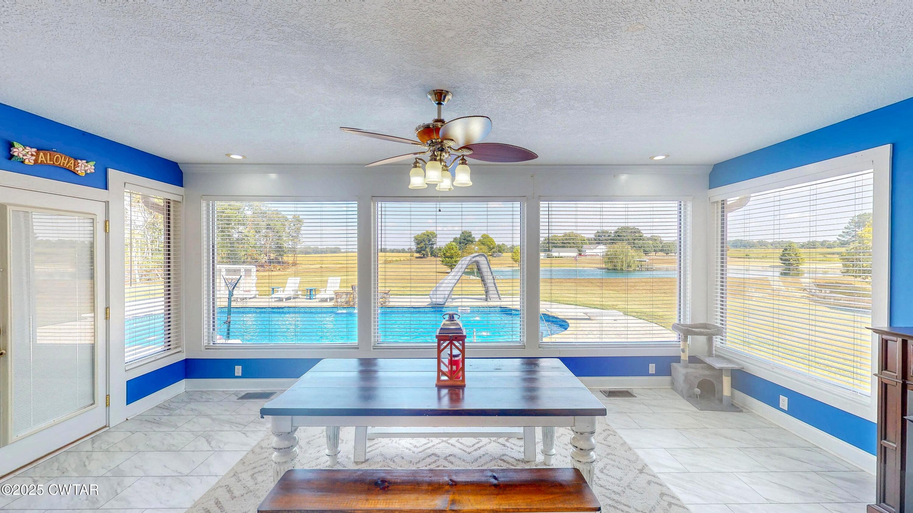 2345 East Grove Road Gleason, TN 38229 - Photo 15 of 44 a room with pool table and large windows