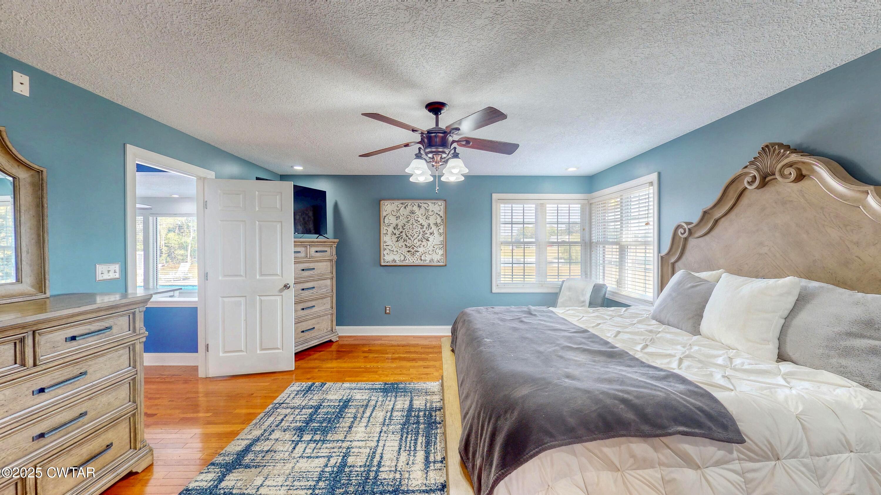 2345 East Grove Road Gleason, TN 38229 - Photo 18 of 44 a bedroom with a bed and window