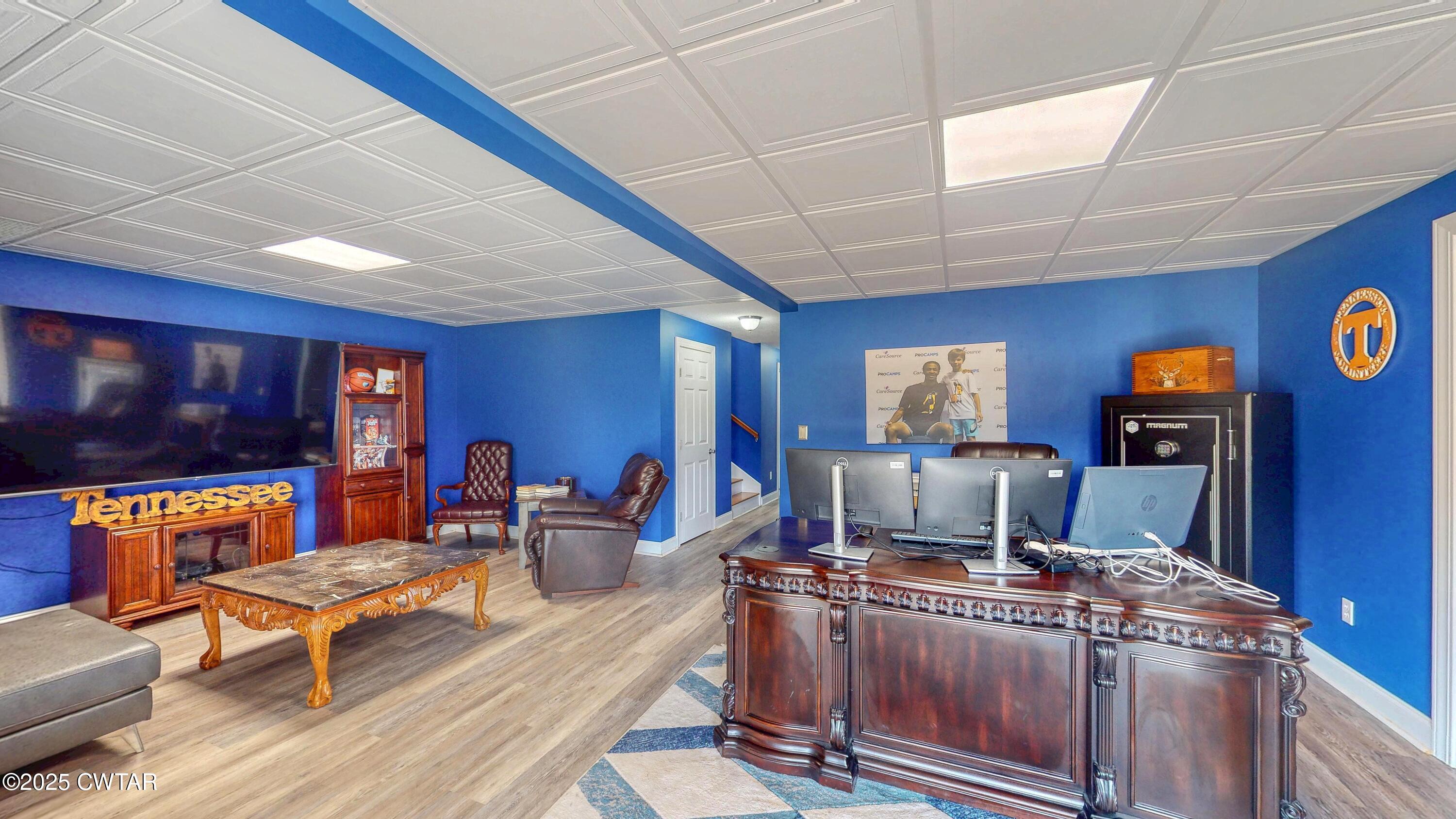2345 East Grove Road Gleason, TN 38229 - Photo 25 of 44 a living room with furniture and a flat screen tv