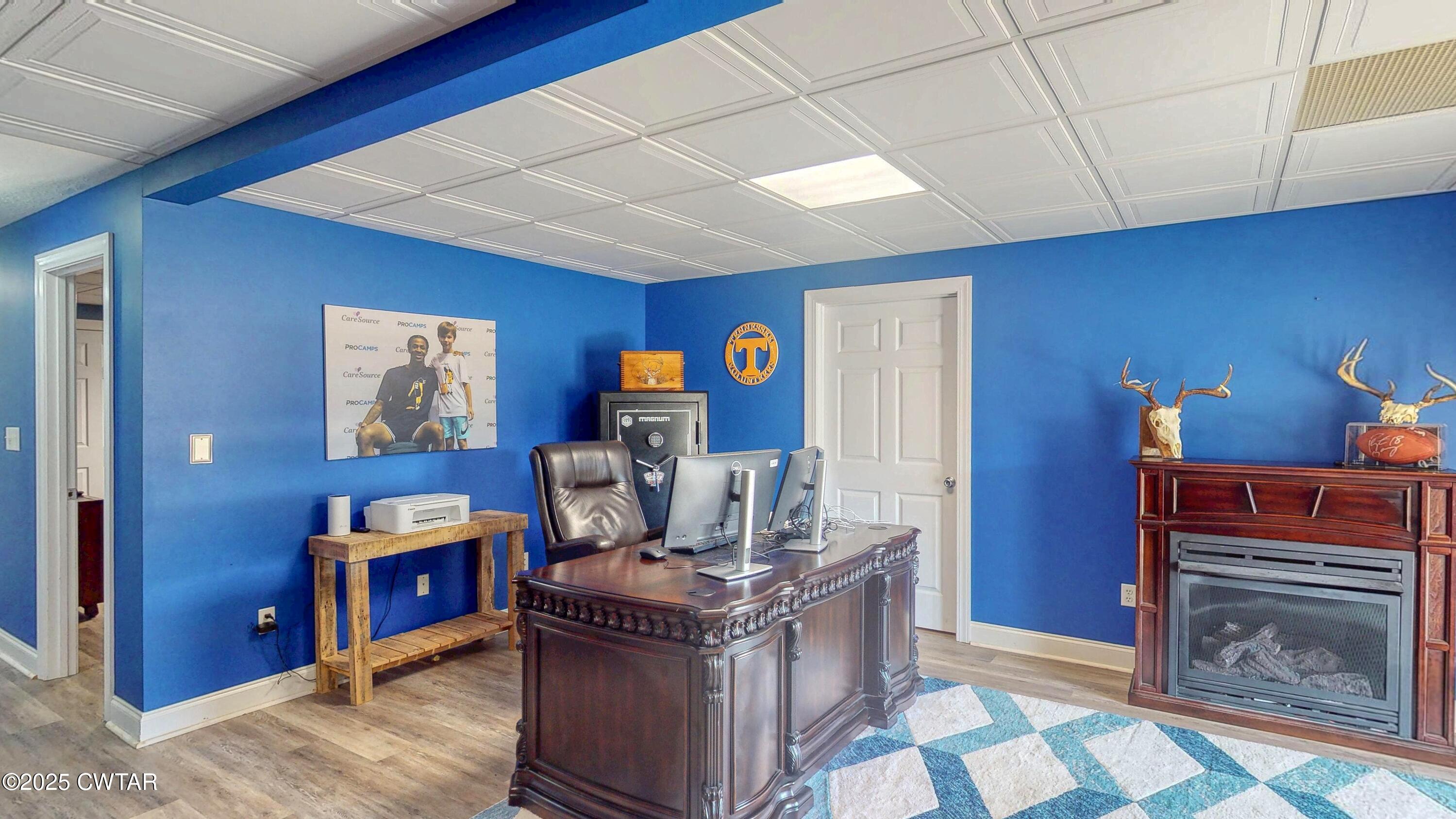 2345 East Grove Road Gleason, TN 38229 - Photo 26 of 44 a living room with furniture and a fireplace