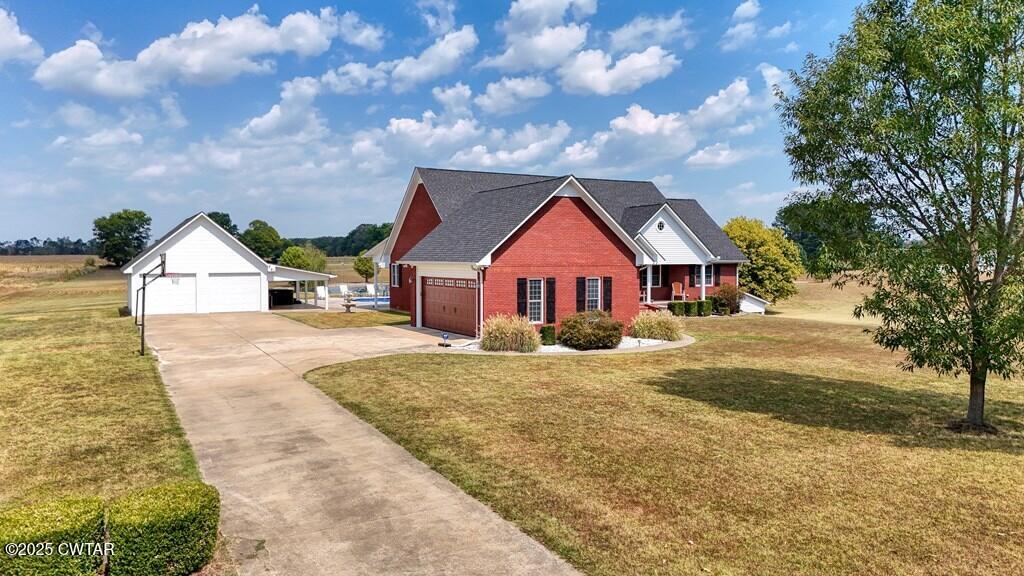2345 East Grove Road Gleason, TN 38229 - Photo 3 of 44 a view of house with wooden fence