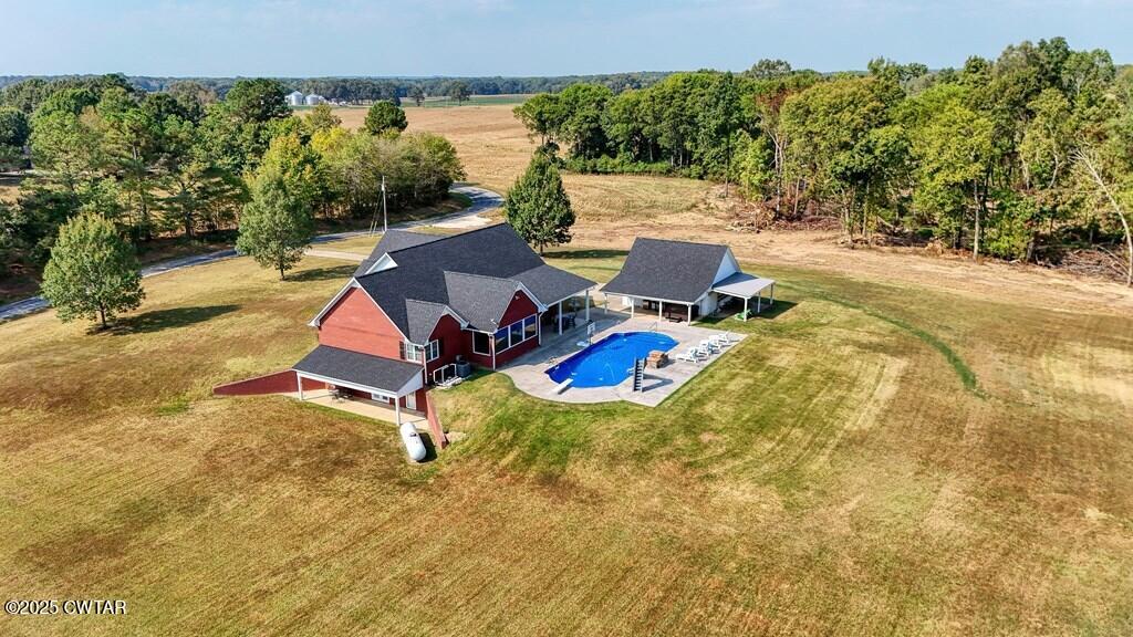 2345 East Grove Road Gleason, TN 38229 - Photo 33 of 44 a view of a swimming pool with a patio