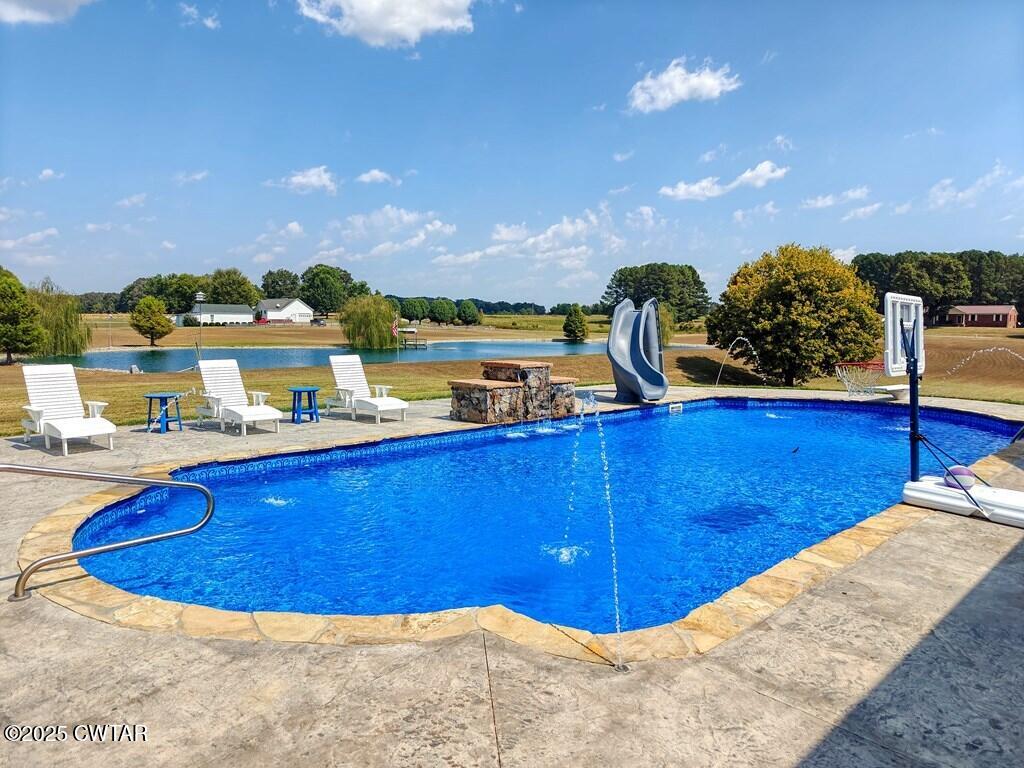 2345 East Grove Road Gleason, TN 38229 - Photo 35 of 44 a view of a swimming pool with an ocean view