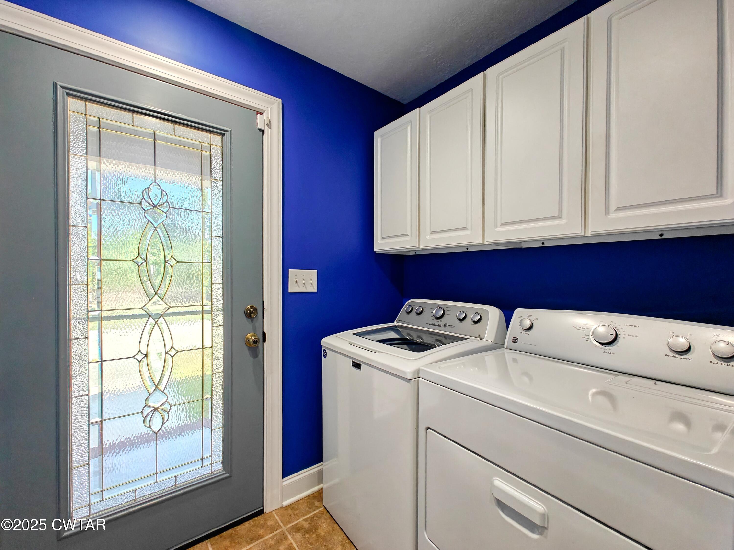 2345 East Grove Road Gleason, TN 38229 - Photo 10 of 44 a utility room with dryer and washer