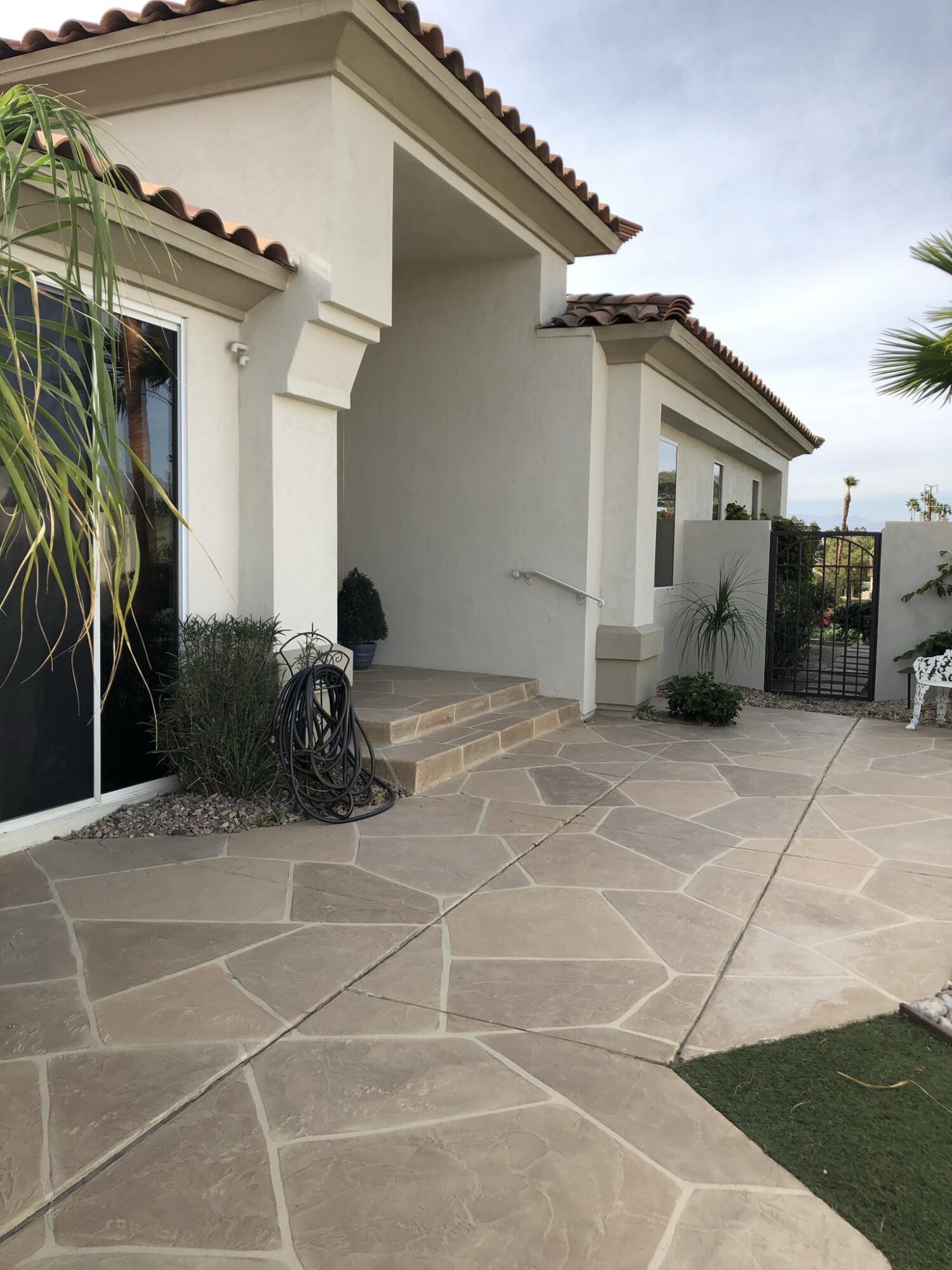 500 Red Arrow Trail Palm Desert, CA 92211 - Photo 12 of 60 a view of a house with a backyard