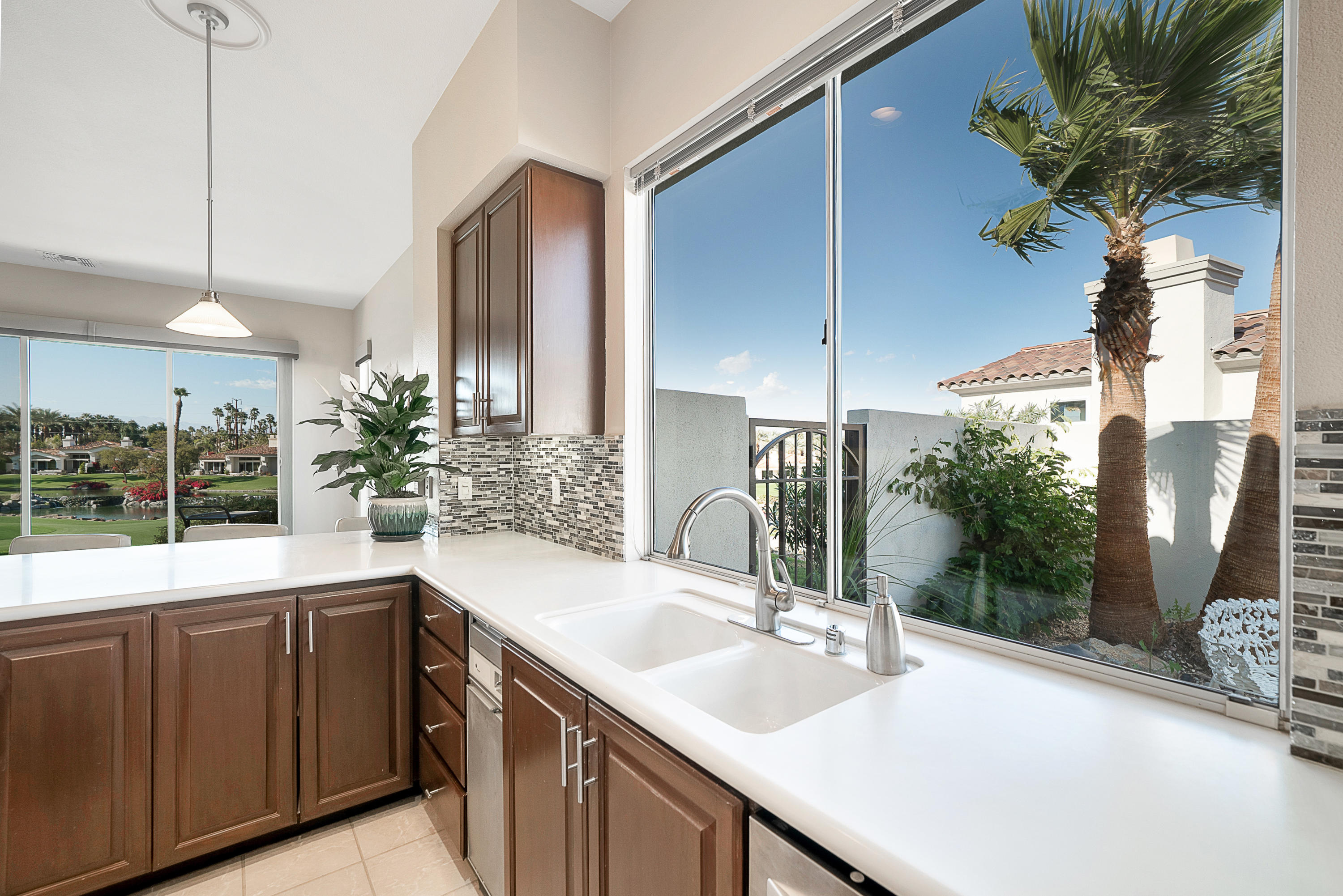 500 Red Arrow Trail Palm Desert, CA 92211 - Photo 17 of 60 a bathroom with a double vanity sink and a mirror