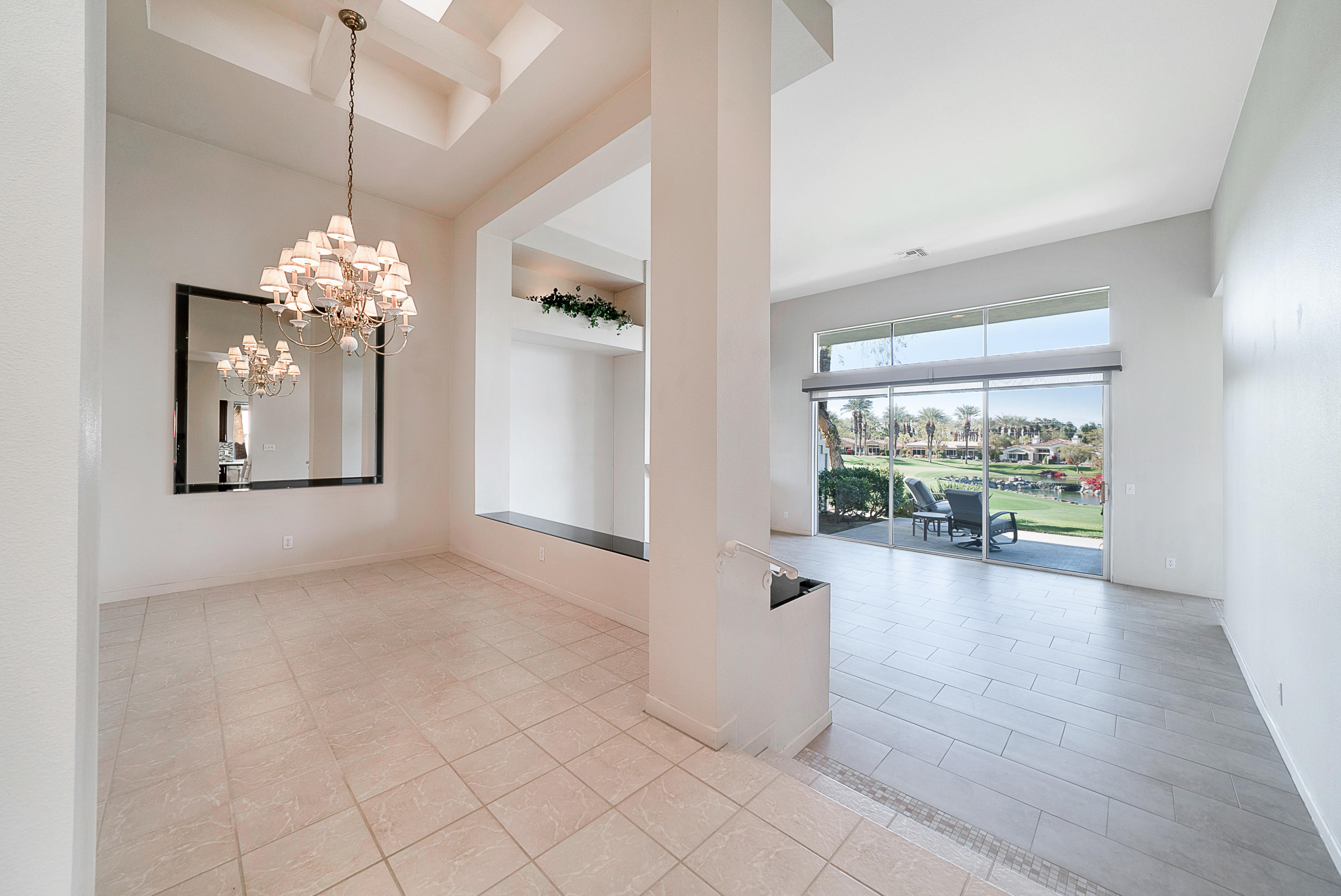 500 Red Arrow Trail Palm Desert, CA 92211 - Photo 25 of 60 a view of a room with wooden floor fireplace and windows