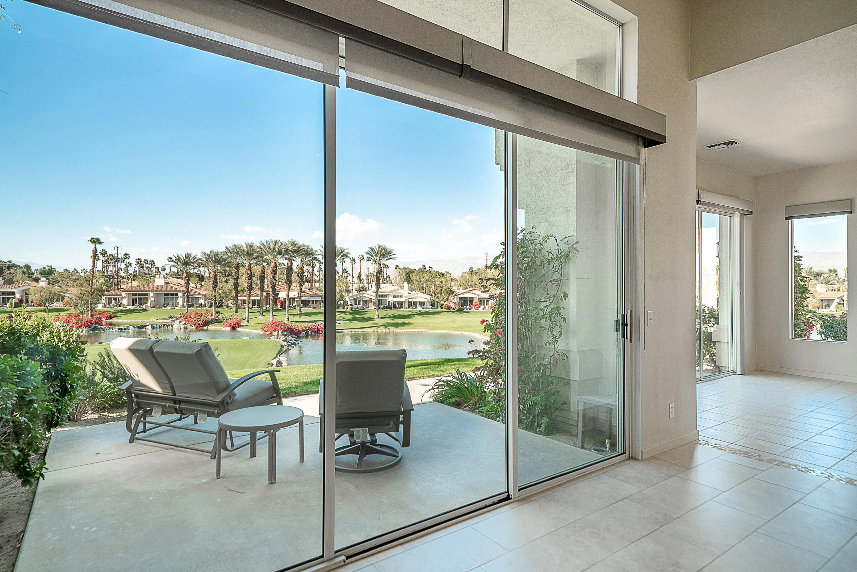 500 Red Arrow Trail Palm Desert, CA 92211 - Photo 29 of 60 a view of a balcony with chair and a barbeque