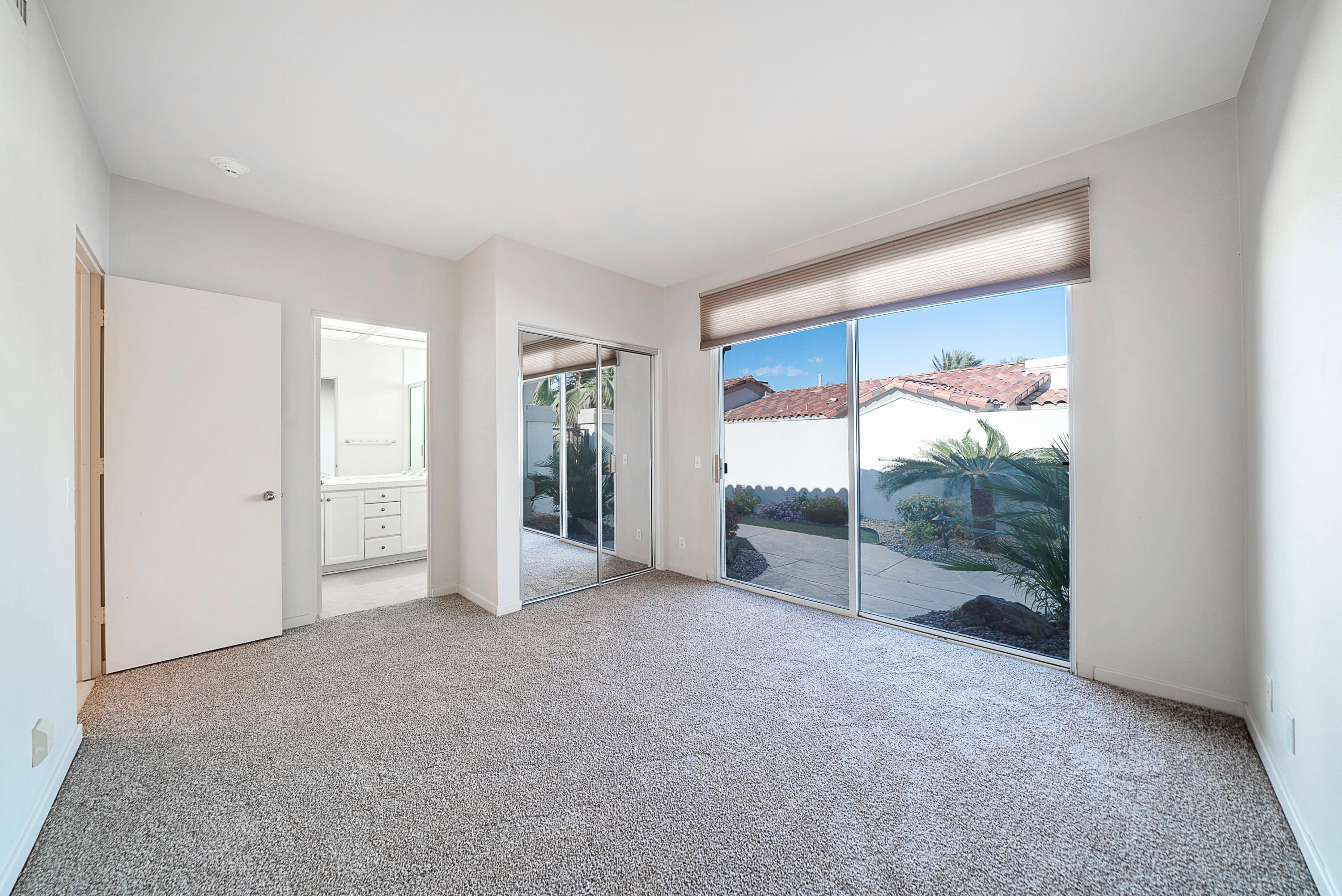 500 Red Arrow Trail Palm Desert, CA 92211 - Photo 32 of 60 a view of empty room with floor to ceiling window
