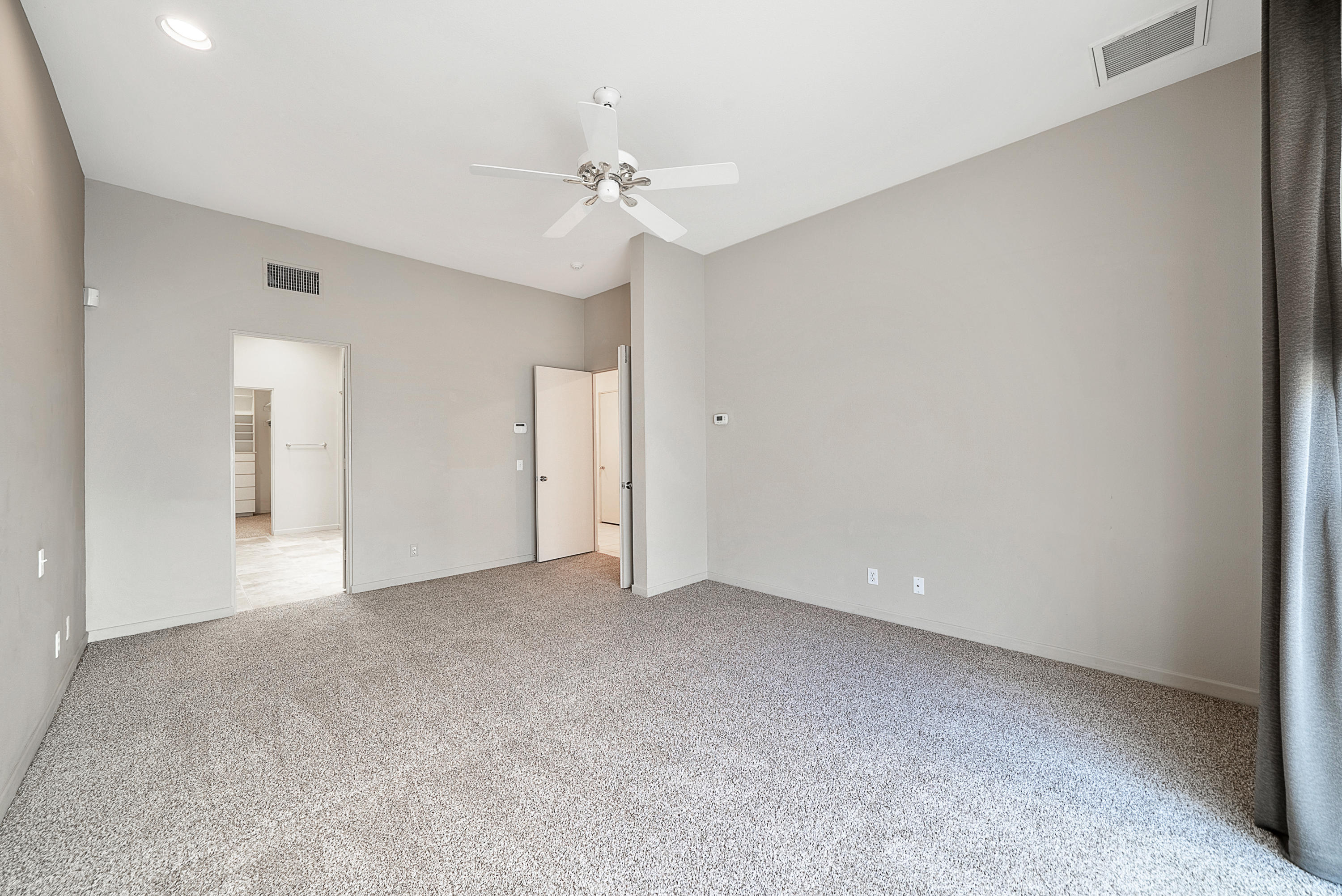 500 Red Arrow Trail Palm Desert, CA 92211 - Photo 35 of 60 a view of an empty room with a ceiling fan