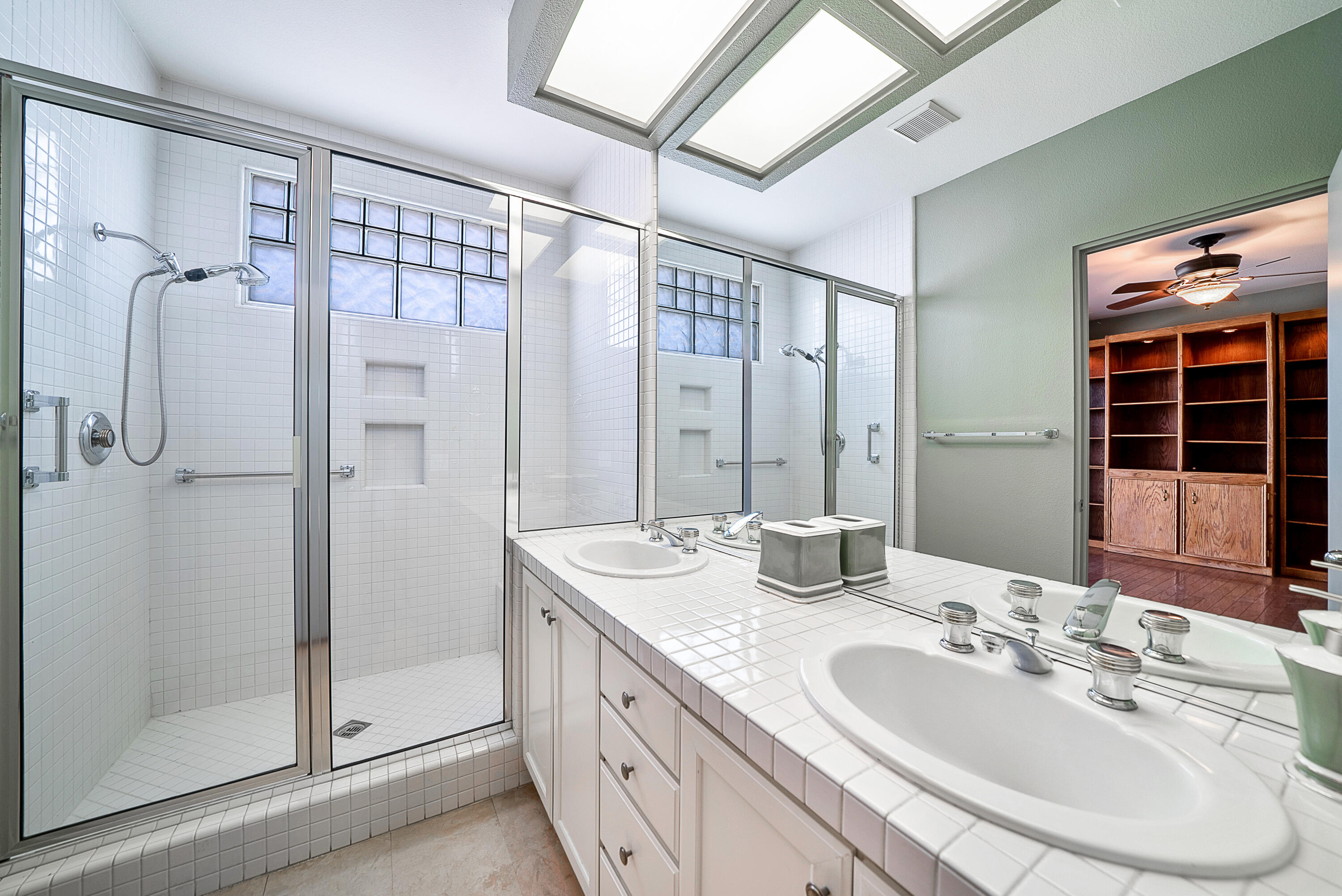 500 Red Arrow Trail Palm Desert, CA 92211 - Photo 41 of 60 a bathroom with a double vanity sink mirror and double