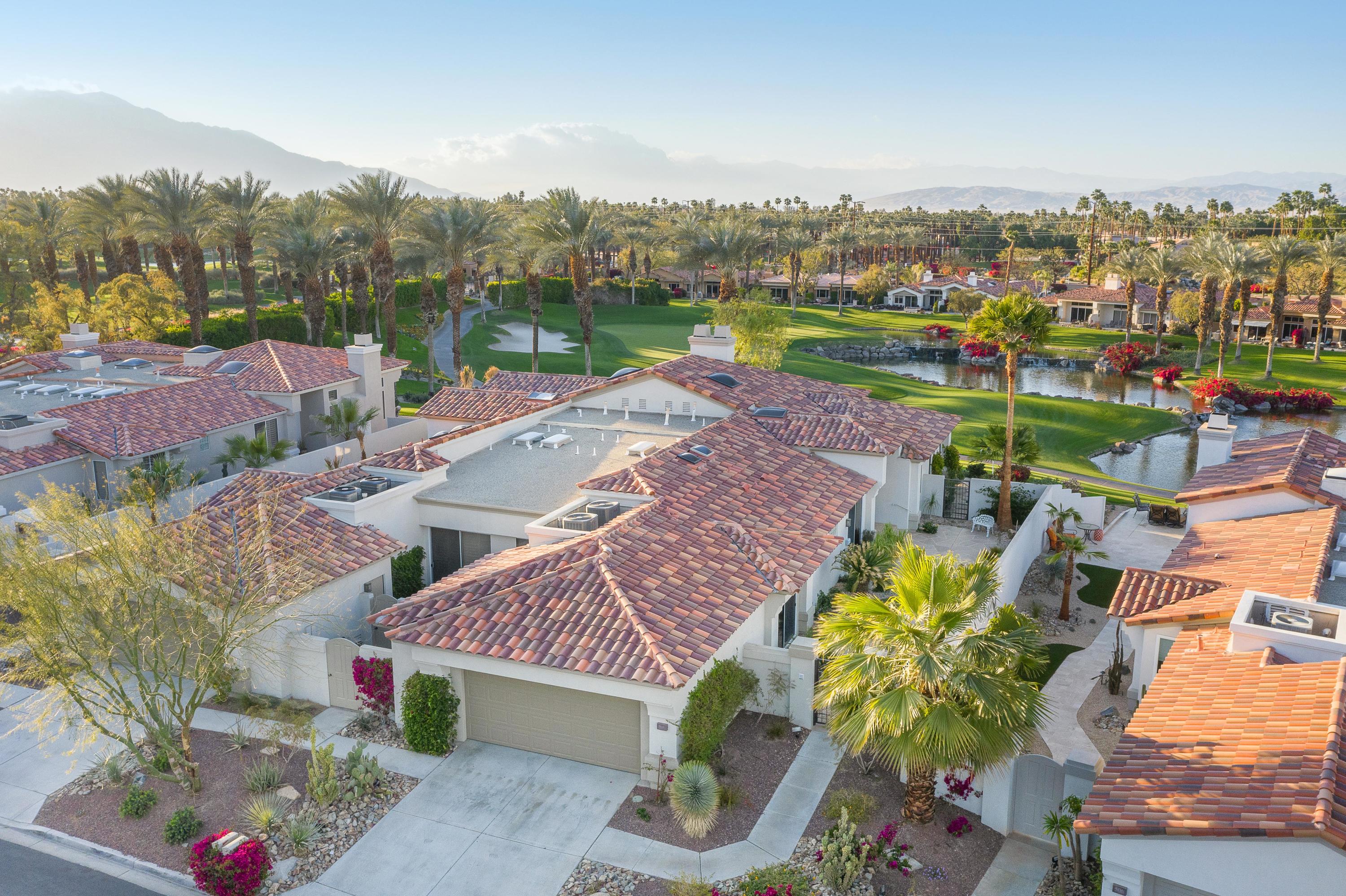 500 Red Arrow Trail Palm Desert, CA 92211 - Photo 43 of 60 an aerial view of a house with a yard wooden table and chairs