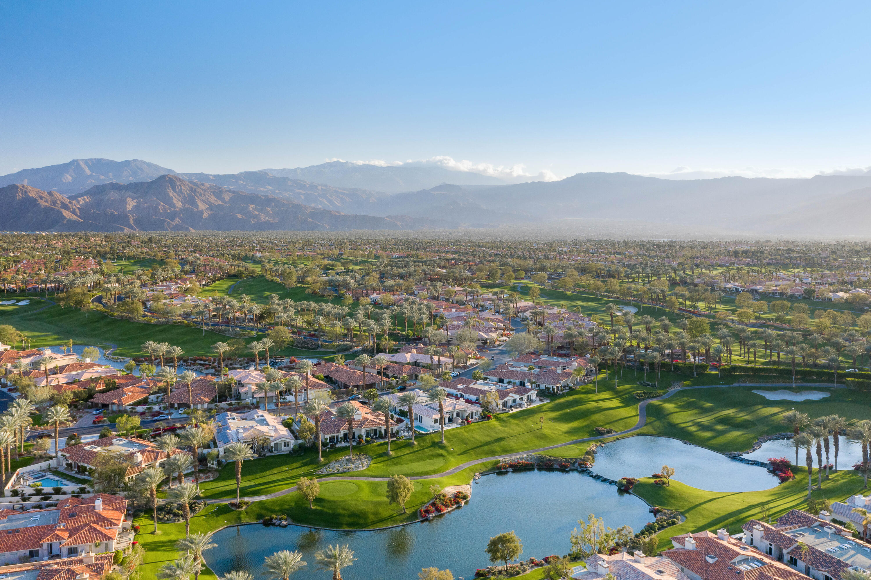 500 Red Arrow Trail Palm Desert, CA 92211 - Photo 45 of 60 a view of a lake with mountains in the background