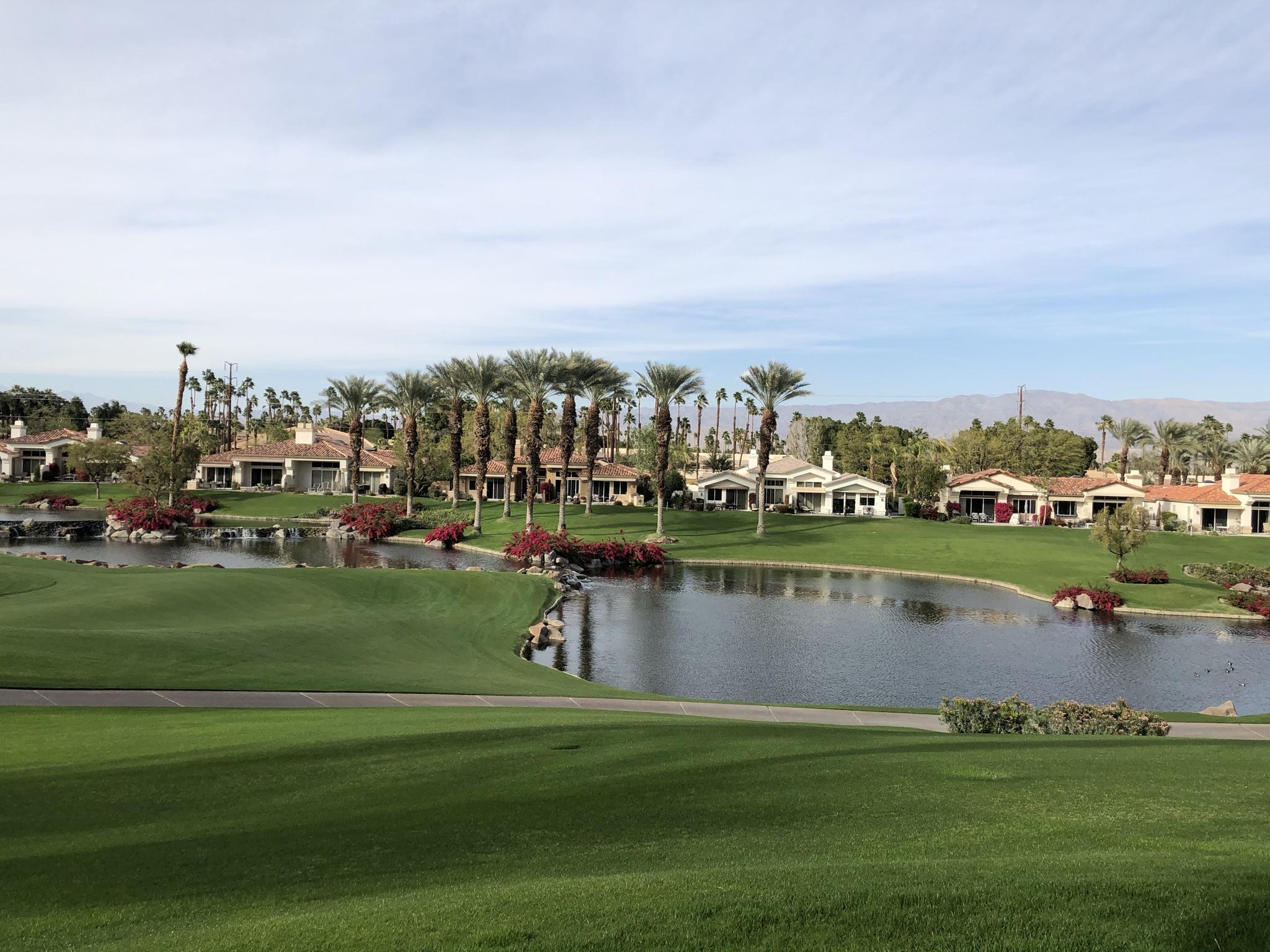 500 Red Arrow Trail Palm Desert, CA 92211 - Photo 54 of 60 a view of a lake with houses in the background