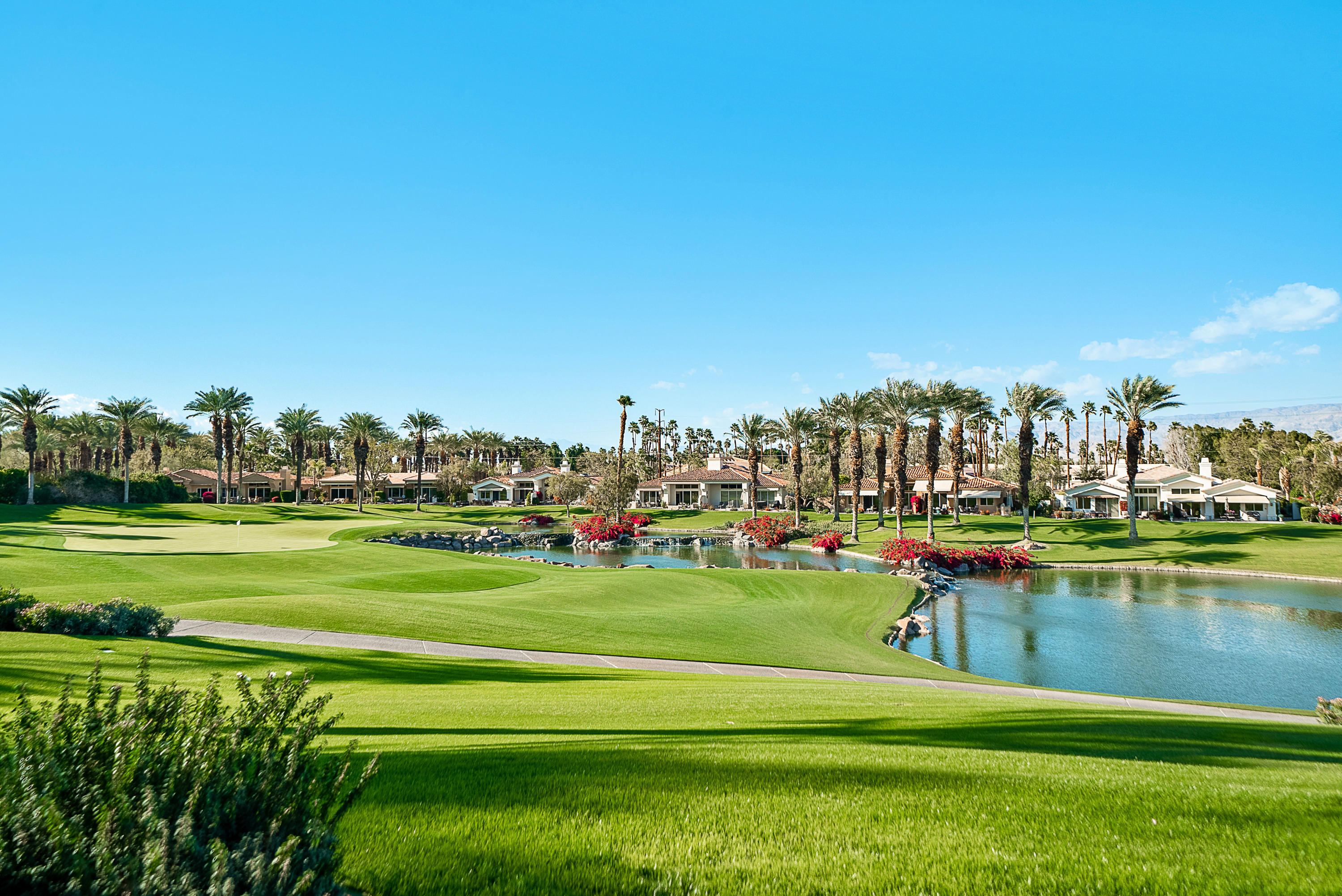 500 Red Arrow Trail Palm Desert, CA 92211 - Photo 57 of 60 a view of swimming pool and trees in the background