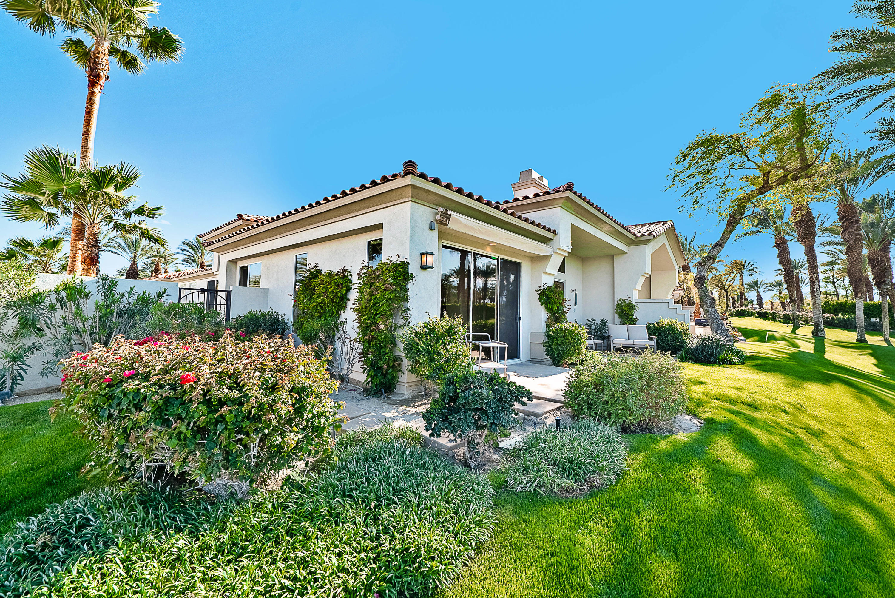 500 Red Arrow Trail Palm Desert, CA 92211 - Photo 59 of 60 a front view of a house with a yard