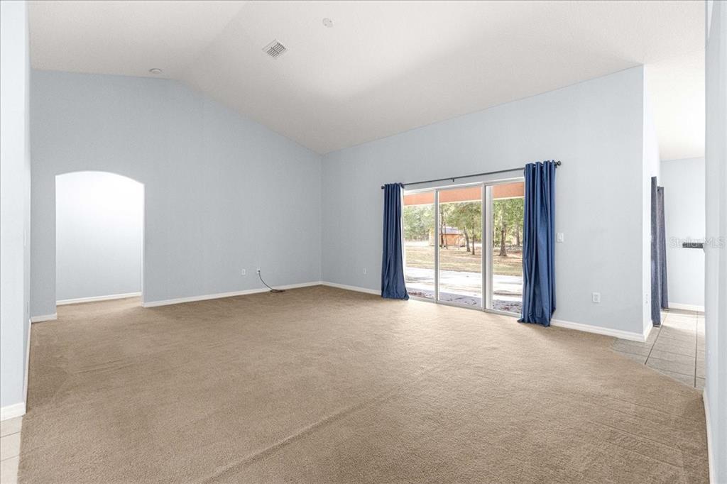 21595 Southwest 84th Loop Dunnellon, FL 34431 - Photo 20 of 62 a view of an empty room with a window
