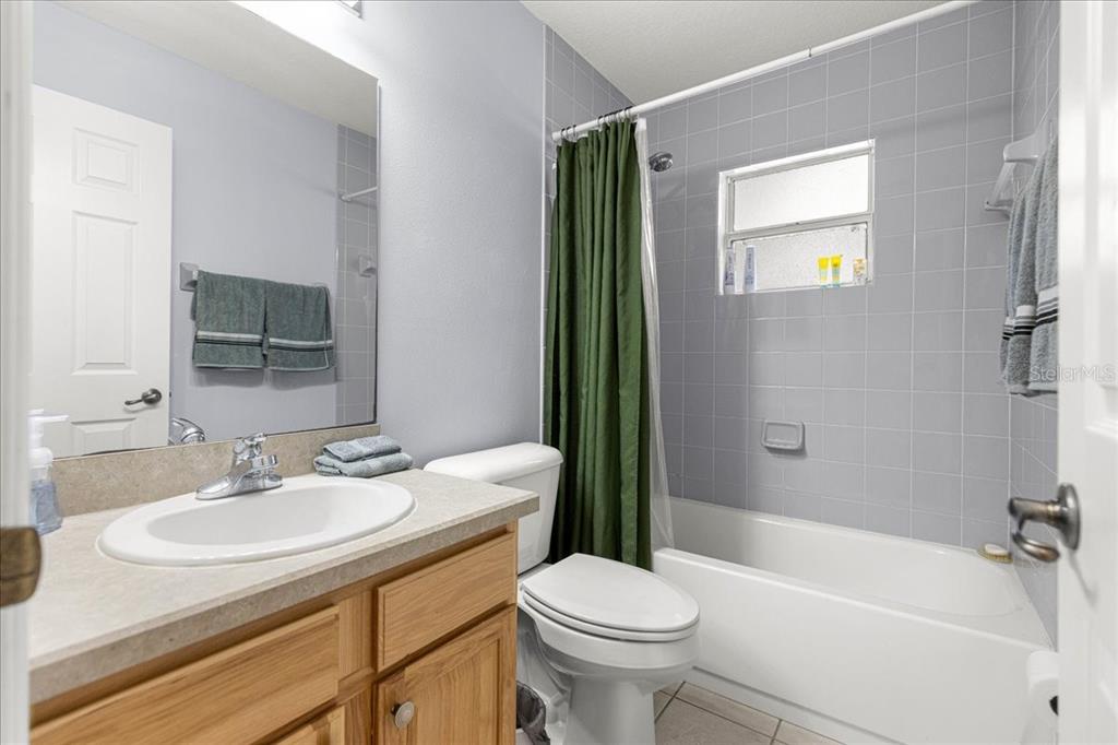 21595 Southwest 84th Loop Dunnellon, FL 34431 - Photo 27 of 62 a bathroom with a sink toilet and shower
