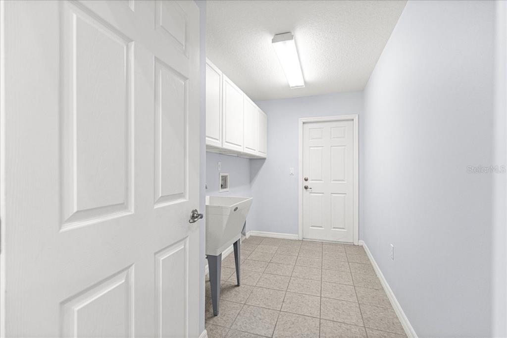 21595 Southwest 84th Loop Dunnellon, FL 34431 - Photo 39 of 62 a view of a kitchen with white cabinets